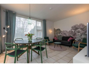 Apartment on an arable farm with mini campsite and playground
